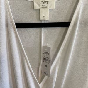 Brand new white body suit